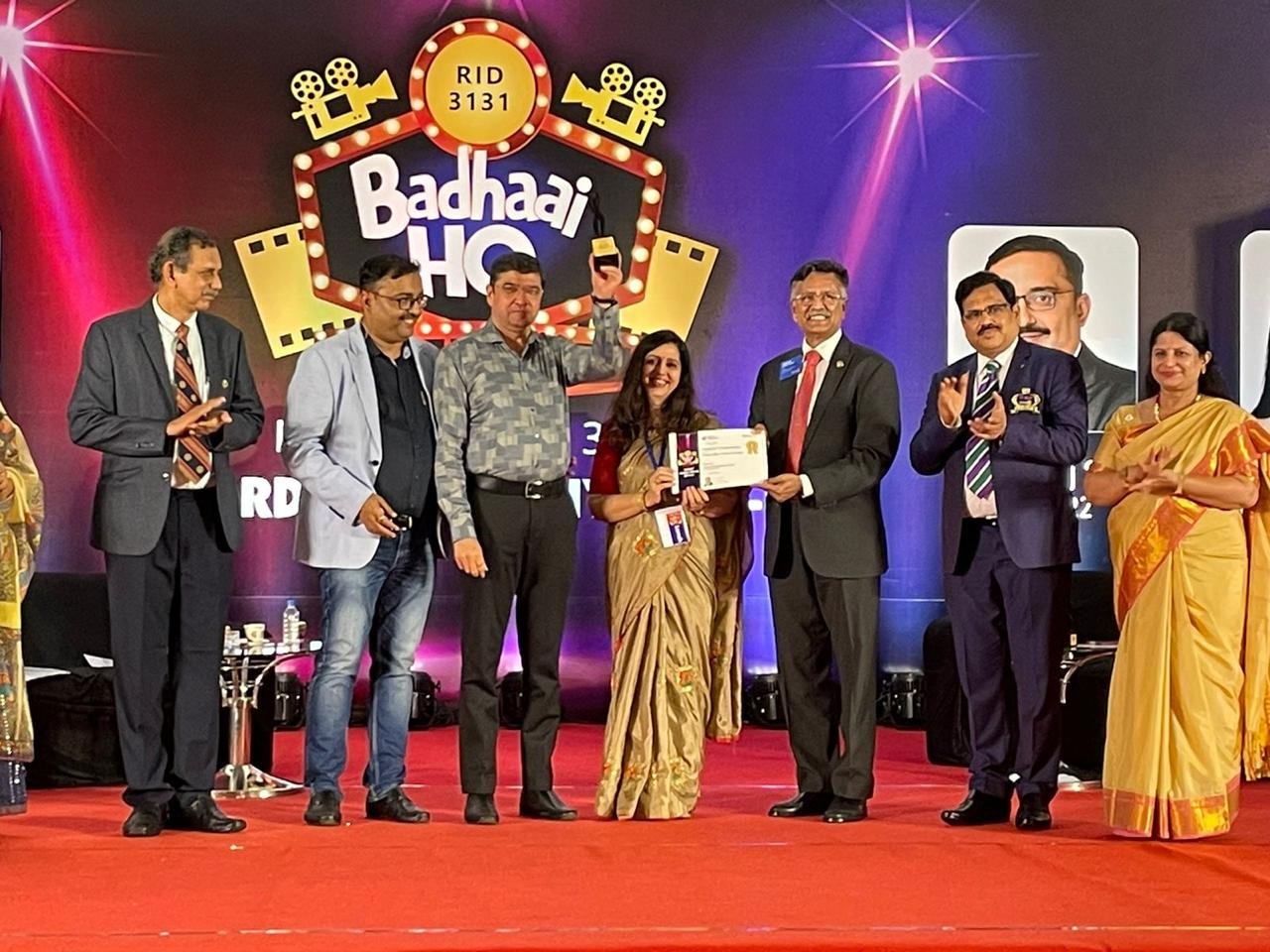 President Rtn. Priyanka Karnik receiving a club award at the District 3131 Badhaai Ho awards function